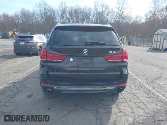 2014 BMW X5 xDrive35i with VIN 5UXKR0C57E0H20944, listed as a IAAI auction lot 42011451 with 208,205 mi miles. Bid and sale history available at carsss.com. Image 16.
