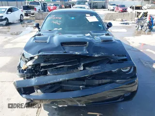 2021 Dodge Challenger R/T Scat Pack z VIN 2C3CDZFJXMH509833, wystawiony jako IAAI lot #41516858 z przebiegiem 66 880 mil mil oraz . Historia ofert i sprzedaży dostępna na DreamBid. Obrazek 12.