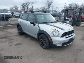 2012 MINI Countryman S with VIN WMWZC5C5XCWL55727, listed as a IAAI auction lot 41729968 with 103,935 mi miles and . Bid and sale history available at DreamBid. Image 1.