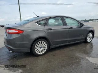 2016 Ford Fusion SE Hybrid с VIN 3FA6P0LU8GR227215, выставлен на аукционе Copart как лот 62669895 с пробегом 249 837 миль миль и Списание • Salvage title. История ставок и продаж доступна на DreamBid. Изображение 3.