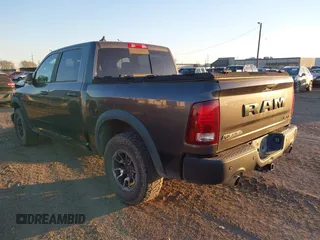 2017 Ram 1500 Rebel z VIN 1C6RR7YT0HS534465, wystawiony jako IAAI lot #41240431 z przebiegiem 125 886 mil mil oraz . Historia ofert i sprzedaży dostępna na DreamBid. Obrazek 3.