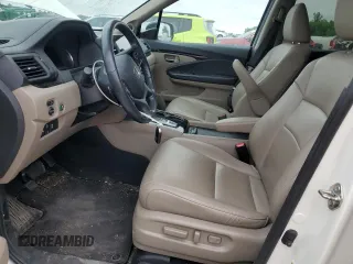 2019 Honda Pilot Touring 7-Passenger with VIN 5FNYF6H6XKB059073, listed as a Copart auction lot 59564345 with 81,599 mi miles and Salvage title. Bid and sale history available at DreamBid. Image 7.