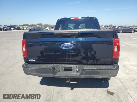 2022 Ford F-150 XL with VIN 1FTMF1E51NKD59265, listed as a Copart auction lot 77193424 with 38,590 mi miles and Salvage Title. Bid and sale history available at DreamBid. Image 6.