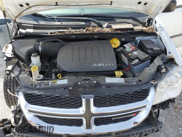 2015 Dodge Grand Caravan American Value with VIN 2C4RDGBG0FR607450, listed as a Copart auction lot 48143485 with 77,882 mi miles and Clean Title. Bid and sale history available at DreamBid. Image 14.