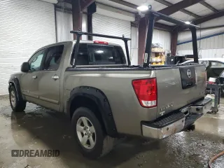2007 Nissan Titan SE z VIN 1N6BA07B07N221489, wystawiony jako Copart lot #83408574 z przebiegiem 92 831 mil mil oraz Szkoda całkowita • Salvage title. Historia ofert i sprzedaży dostępna na DreamBid. Obrazek 2.
