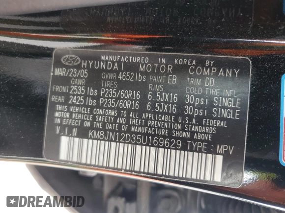 2005 Hyundai Tucson GLS with VIN KM8JN12D35U169629, listed as a Copart auction lot 57719265 with 97,467 mi miles and Clean title. Bid and sale history available at DreamBid. Image 13.