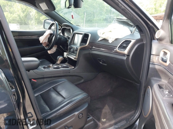 2016 Jeep Grand Cherokee Overland with VIN 1C4RJFCG3GC417699, listed as a IAAI auction lot 42419054 with 109,911 mi miles and . Bid and sale history available at DreamBid. Image 5.