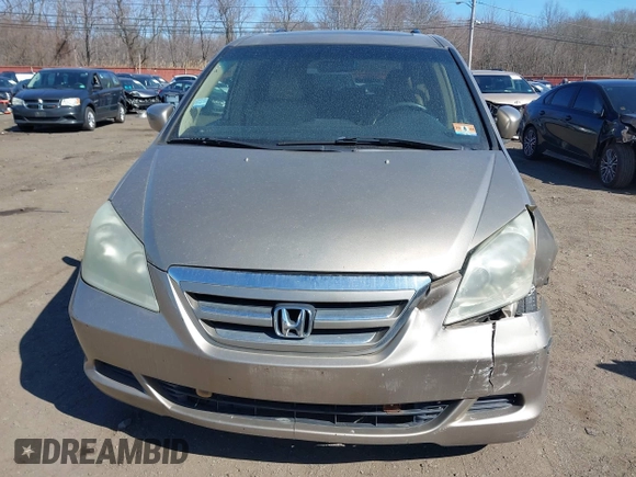 2006 Honda Odyssey EX-L z VIN 5FNRL38736B069969, wystawiony jako IAAI lot #41695311 z przebiegiem 196 218 mil mil oraz . Historia ofert i sprzedaży dostępna na DreamBid. Obrazek 12.