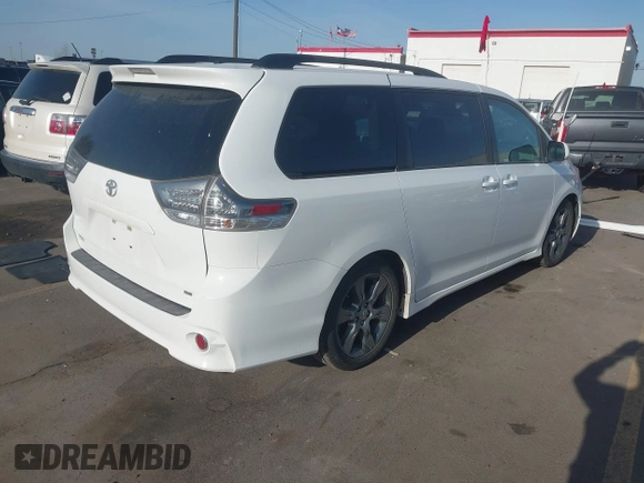 2012 Toyota Sienna SE with VIN 5TDXK3DC1CS221798, listed as a IAAI auction lot 41989210 with 198,962 mi miles. Bid and sale history available at carsss.com. Image 4.