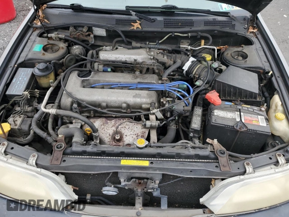 2000 Infiniti G20 Luxury z VIN JNKCP11A1YT304887, wystawiony jako Copart lot #74562724 z przebiegiem 202 140 mil mil oraz Czysty tytuł • Clean title. Historia ofert i sprzedaży dostępna na DreamBid. Obrazek 11.