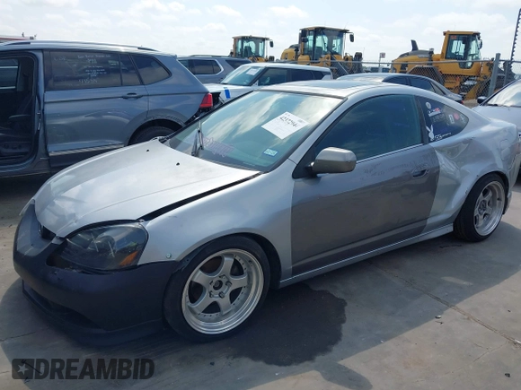 2005 Acura RSX with VIN JH4DC54805S001682, listed as a IAAI auction lot 42372944 with 183,816 mi miles and . Bid and sale history available at DreamBid. Image 2.