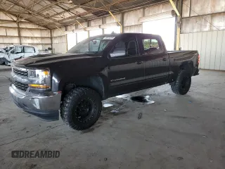 2016 Chevrolet Silverado 1500 LT with VIN 3GCPCREC0GG318817, listed as a Copart auction lot 49978265 with 134,075 mi miles and Salvage Title. Bid and sale history available at DreamBid. Image 1.