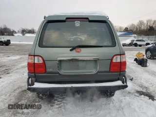 2002 Lexus LX 470 z VIN JTJHT00W923514121, wystawiony jako Copart lot #87761105 z przebiegiem 247 752 mil mil oraz Szkody całkowita. Historia ofert i sprzedaży dostępna na DreamBid. Obrazek 6.