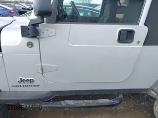 2005 Jeep Wrangler Unlimited with VIN 1J4FA44S25P340852, listed as a IAAI auction lot 41441671 with 139,302 mi miles. Bid and sale history available at carsss.com. Image 14.
