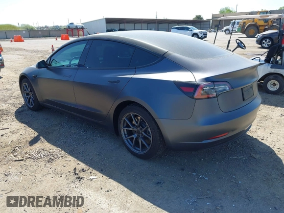 2023 Tesla Model 3 z VIN 5YJ3E1EA2PF404614, wystawiony jako IAAI lot #42009539 z przebiegiem 22 105 mil mil oraz . Historia ofert i sprzedaży dostępna na DreamBid. Obrazek 3.