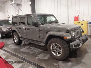 2019 Jeep Wrangler Unlimited Sahara with VIN 1C4HJXEN5KW620050, listed as a IAAI auction lot 41465823 with 76,060 mi miles and . Bid and sale history available at DreamBid. Image 1.