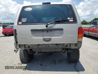2000 Jeep Cherokee SE with VIN 1J4FF28SXYL140930, listed as a Copart auction lot 59191035 with 248,598 mi miles and Salvage title. Bid and sale history available at DreamBid. Image 6.