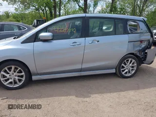 2012 Mazda 5 Grand Touring z VIN JM1CW2DL2C0127851, wystawiony jako IAAI lot #42217090 z przebiegiem 123 900 mil mil oraz . Historia ofert i sprzedaży dostępna na DreamBid. Obrazek 14.