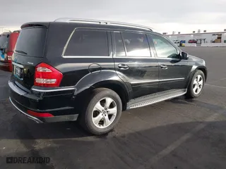 2011 Mercedes-Benz GL-Class GL 450 with VIN 4JGBF7BE1BA752615, listed as a IAAI auction lot 41075508 with 165,605 mi miles. Bid and sale history available at carsss.com. Image 4.