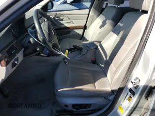 2009 BMW 3 Series 328i with VIN WBAPH73589E128233, listed as a Copart auction lot 88367785 with 63,142 mi miles and Salvage title. Bid and sale history available at DreamBid. Image 7.