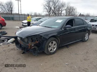 2014 Chevrolet Impala LS with VIN 2G1WA5E39E1136977, listed as a IAAI auction lot 41843947 with 122,709 mi miles and . Bid and sale history available at DreamBid. Image 18.