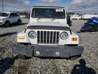 2006 Jeep Wrangler Sport Right Hand Drive with VIN 1J4F449S26P741397, listed as a Copart auction lot 41656585 with 205,683 mi miles and Clean Title. Bid and sale history available at carsss.com. Image 5.