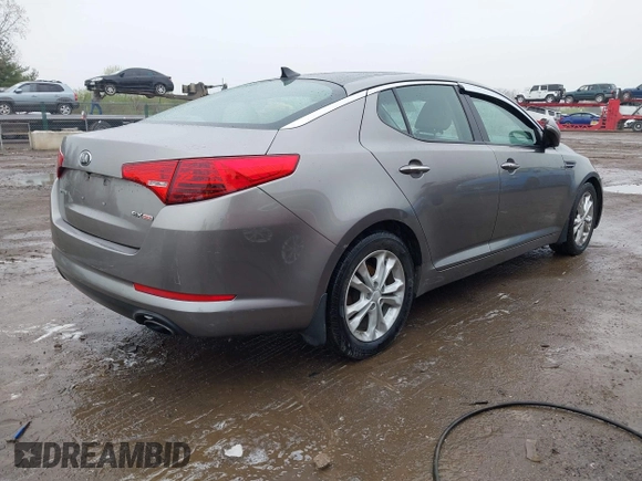 2013 Kia Optima EX z VIN 5XXGN4A72DG166687, wystawiony jako IAAI lot #41967631 z przebiegiem 202 712 mil mil oraz . Historia ofert i sprzedaży dostępna na DreamBid. Obrazek 4.