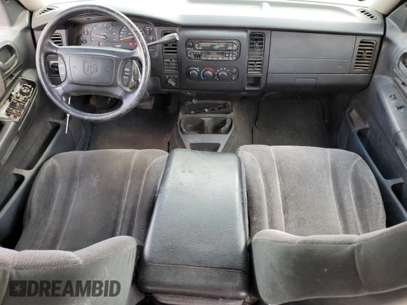 2001 Dodge Dakota z VIN 1B7HG2AX81S320355, wystawiony jako Copart lot #55410715 z przebiegiem 164 931 mil mil oraz Szkoda całkowita • Salvage title. Historia ofert i sprzedaży dostępna na DreamBid. Obrazek 8.