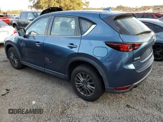 2017 Mazda CX-5 Sport with VIN JM3KFABL4H0124781, listed as a Copart auction lot 73826154 with 126,867 mi miles and Non Repairable. Bid and sale history available at carsss.com. Image 2.