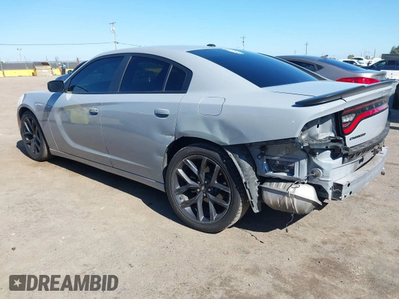2022 Dodge Charger SXT with VIN 2C3CDXBG3NH231325, listed as a IAAI auction lot 41667810 with 74,967 mi miles and . Bid and sale history available at DreamBid. Image 3.