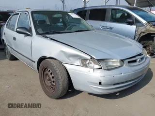2000 Toyota Corolla VE with VIN 1NXBR12E6YZ393077, listed as a IAAI auction lot 42111914 with 181,056 mi miles and . Bid and sale history available at DreamBid. Image 1.