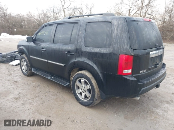 2011 Honda Pilot Touring with VIN 5FNYF4H94BB089930, listed as a IAAI auction lot 41477596 with 171,831 mi miles. Bid and sale history available at carsss.com. Image 3.