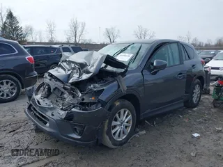 2014 Mazda CX-5 Touring with VIN JM3KE4CY6E0387767, listed as a IAAI auction lot 41698128 with 1 mi miles. Bid and sale history available at carsss.com. Image 23.
