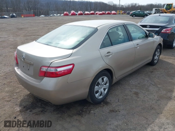 2009 Toyota Camry with VIN 4T1BE46K99U834926, listed as a IAAI auction lot 41853947 with 214,044 mi miles. Bid and sale history available at carsss.com. Image 4.