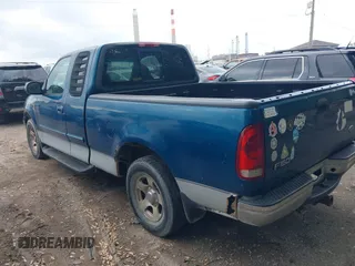 1999 Ford F-150 XL with VIN 1FTRX17L0XNC07560, listed as a IAAI auction lot 42183858 with Not provided miles and . Bid and sale history available at DreamBid. Image 3.