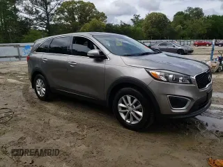2018 Kia Sorento LX z VIN 5XYPG4A31JG345348, wystawiony jako Copart lot #55413455 z przebiegiem 64 868 mil mil oraz Szkoda całkowita • Salvage title. Historia ofert i sprzedaży dostępna na DreamBid. Obrazek 14.
