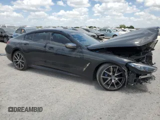 2020 BMW 8 Series M850i with VIN WBAGV8C0XLBP48769, listed as a Copart auction lot 66769684 with 0 mi miles and Salvage Title. Bid and sale history available at carsss.com. Image 4.