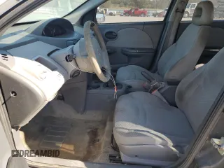 2003 Saturn ION ION 1 z VIN 1G8AF52F83Z151812, wystawiony jako Copart lot #77000594 z przebiegiem 313 620 mil mil oraz Szkoda całkowita • Salvage title. Historia ofert i sprzedaży dostępna na DreamBid. Obrazek 7.