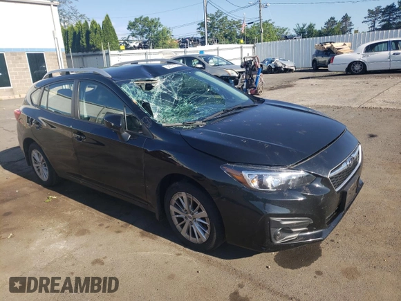 2018 Subaru Impreza Premium with VIN 4S3GTAB68J3739274, listed as a Copart auction lot 62193185 with 58,518 mi miles and Salvage title. Bid and sale history available at DreamBid. Image 4.
