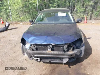 2014 Volkswagen Jetta S z VIN 3VW2K7AJ2EM429306, wystawiony jako IAAI lot #42161911 z przebiegiem 129 997 mil mil oraz . Historia ofert i sprzedaży dostępna na DreamBid. Obrazek 12.