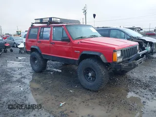 1996 Jeep Cherokee Sport with VIN 1J4FJ68S4TL244893, listed as a IAAI auction lot 41190369 with 192,459 mi miles and . Bid and sale history available at DreamBid. Image 1.