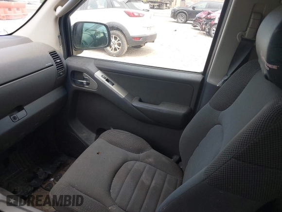 2005 Nissan Pathfinder SE with VIN 5N1AR18W45C779915, listed as a IAAI auction lot 42522452 with 260,904 mi miles and . Bid and sale history available at DreamBid. Image 5.