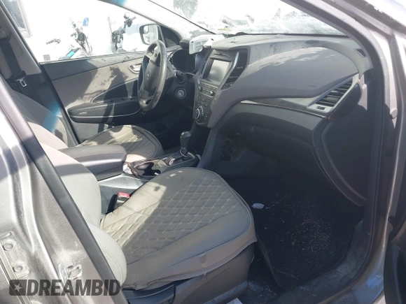 2017 Hyundai Santa Fe 2.4L with VIN 5NMZUDLB4HH034437, listed as a IAAI auction lot 41565545 with 96,640 mi miles and . Bid and sale history available at DreamBid. Image 5.