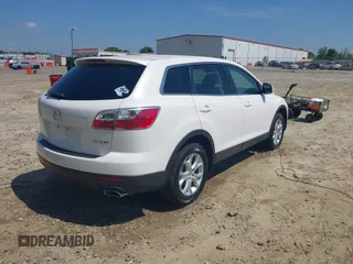 2011 Mazda CX-9 Sport with VIN JM3TB2BA7B0304087, listed as a IAAI auction lot 42138663 with 186,964 mi miles and . Bid and sale history available at DreamBid. Image 4.