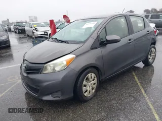 2013 Toyota Yaris L with VIN JTDKTUD39DD552185, listed as a IAAI auction lot 41577259 with 159,662 mi miles. Bid and sale history available at carsss.com. Image 2.