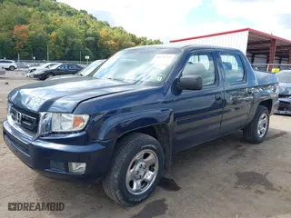2011 Honda Ridgeline RT with VIN 5FPYK1F20BB001723, listed as a IAAI auction lot 40376797 with 167,706 mi miles. Bid and sale history available at carsss.com. Image 2.