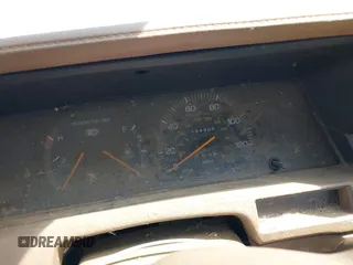 1987 Toyota Camry z VIN JT2SV21EXH3130273, wystawiony jako IAAI lot #42472806 z przebiegiem 124 958 mil mil oraz . Historia ofert i sprzedaży dostępna na DreamBid. Obrazek 7.