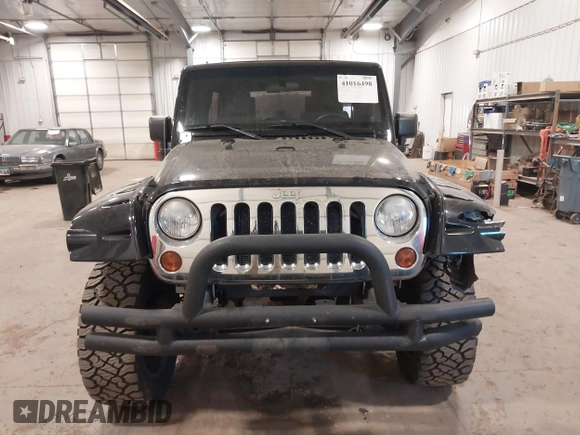 2008 Jeep Wrangler Unlimited X with VIN 1J4GA391X8L558984, listed as a IAAI auction lot 41016498 with 123,308 mi miles. Bid and sale history available at carsss.com. Image 12.