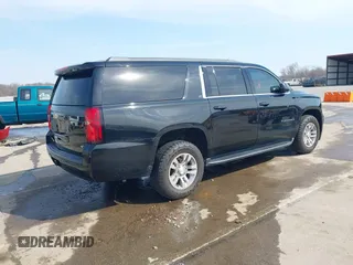 2018 Chevrolet Suburban LT with VIN 1GNSCHKC3JR237396, listed as a IAAI auction lot 41774171 with 205,970 mi miles and . Bid and sale history available at DreamBid. Image 4.