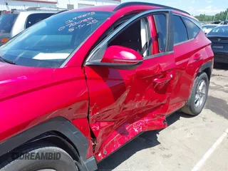 2022 Hyundai Tucson SEL with VIN 5NMJB3AE6NH070085, listed as a IAAI auction lot 42235039 with 28,931 mi miles and . Bid and sale history available at DreamBid. Image 6.